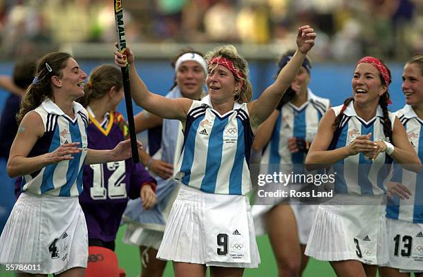 Argentinian players Paz Ferrari Paola Vukojicic , Vanina Oneto , Magadelina Aicega and Laura Maiztegui celebrate their 71 win over New Zealand in...
