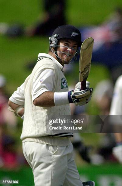 Black Caps batsman Craig McMillan celebrates his world record 26 runs off one over in test cricket, from Younis Khan before being caught out on 98,...