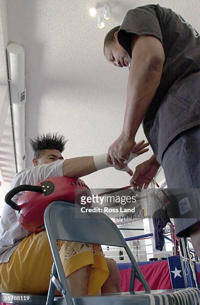 David Tua has his hands tapped by trainer Ronnie Shields, for trainind in the Gym at Prince Ranch Resort, Mt Charleston, north of Las Vegas. Tua is...