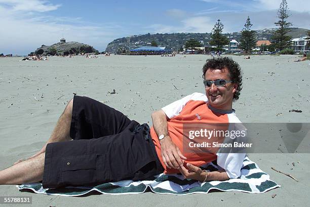 Cricket umpire Billy Bowden relaxing on Sumner Beach.