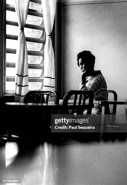 Portrait of an unidentified inmate as she sits near a window at Audy Home, a Cook County juvenile detention center, Chicago, Illinois, 1968.