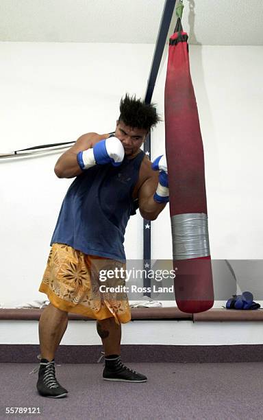 David Tua hits the Tuaman bannana bag in the Gym at his training camp at Prince Ranch Resort, Mt Charleston, north of Las Vegas. Tua is sceduled to...