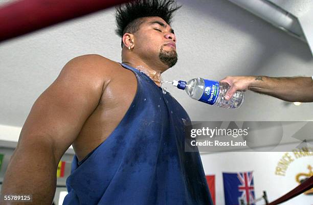 David Tua cools off with water, during training in the Gym at Prince Ranch Resort, Mt Charleston, north of Las Vegas. Tua is sceduled to fight Lennox...