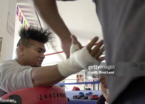 David Tua has his hands tapped for trainind in the Gym at Prince Ranch Resort, Mt Charleston, north of Las Vegas. Tua is sceduled to fight Lennox...