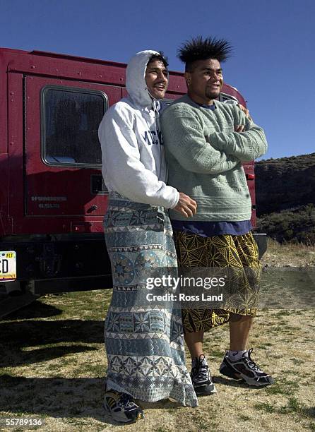 David Tua and middleweight boxer Maselino Masoe enjoy the view beside the Hummer vehicle driven by Tua at his training camp at Mt Charleston, north...