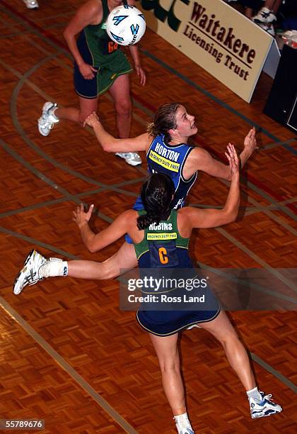 Diamonds wing defence Kimberly Horton competes for possesion with Flyers centre Renee Robins, during the 4545 draw in the National Bank cup netball...