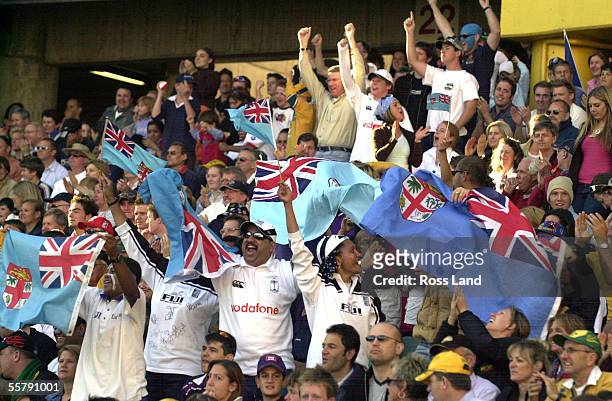 Fijian supporters cheer as their side takes an early lead before losing 2220 to Scotland in their Rugby World Cup 2003 Pool B clash at Aussie...