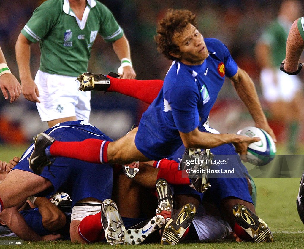 French captain Fabien Galthie passes from the back
