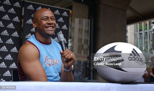 Former All Black legend Jonah Lomu speaks to fans during a public signing session at the Adidas Super store in Sydney as the All Blacks prepare for...