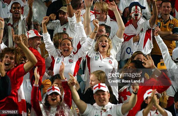 England fans celebrate a Jason Robinson try during the Rugby World Cup 2003 final match between England and Australia at the Sydney Olympic Stadium,...