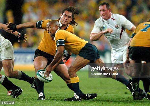 George Gregan passes as George Smith and Richard Hill look on during Englands 2017 win over Australia in extra time in the Rugby World Cup 2003 final...