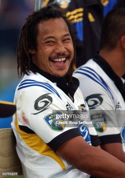 Hurricanes Tana Umaga enjoys a laugh while watching his team play the Chiefs in a pre season Super 12 Rugby game at the Levin Domain, Friday. The...