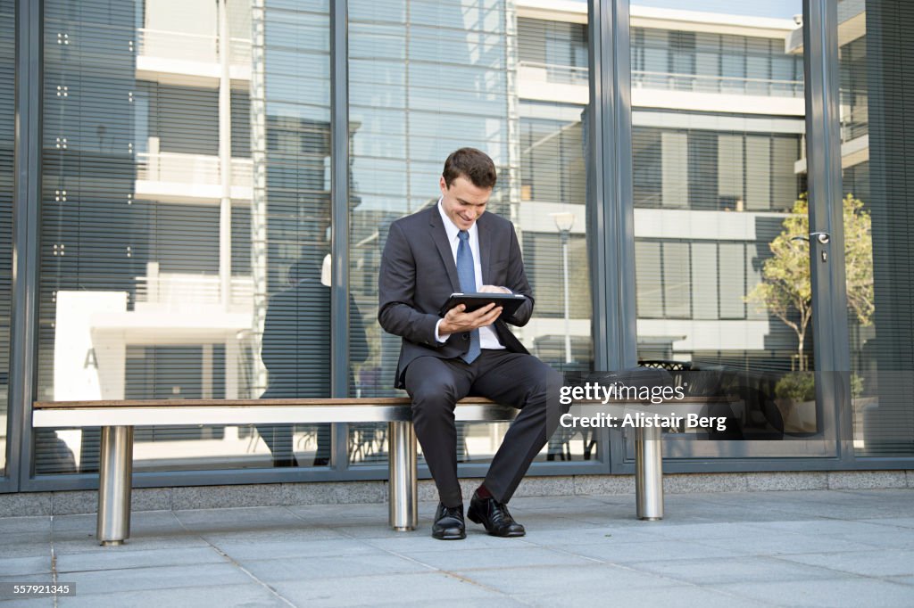 Businessman outside office building