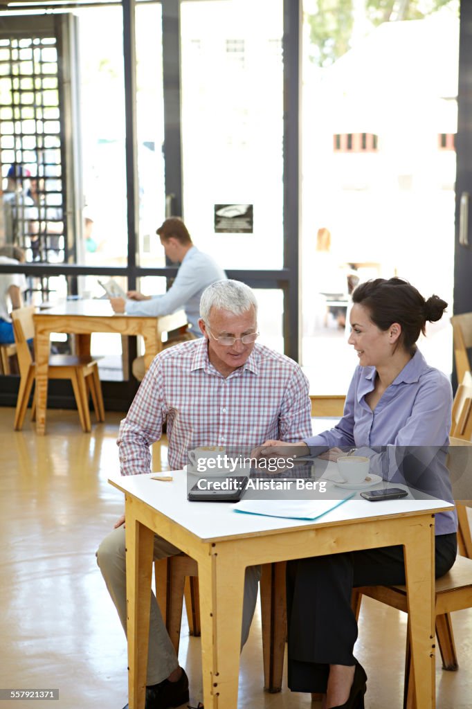 Business meeting in a cafe