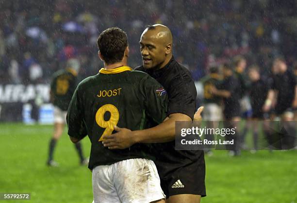 Jonah Lomu embraces Joost van deer Westhuizen, after the All Blacks 123 win over the Springboks in the first TriNations rugby test at Newlands...