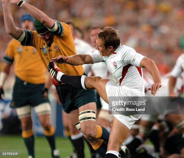 Jonny Wilkinson clears the ball under pressure from Justin Harrison during Englands 2017 win over Australia in extra time in the Rugby World Cup 2003...