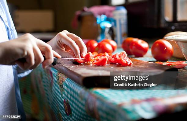 woman cutting tomatoes, close-up of hands - chopped stock pictures, royalty-free photos & images