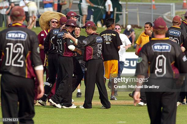 Members of the Northern Knights and their fans celebrate in the middle after they beat the Auckland Aces by 3 wickets in the Final of the State...