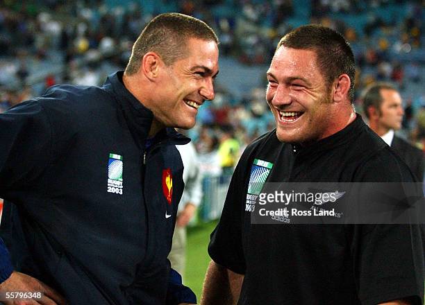 New Zealand born French player Tony Marsh and Mark Hammett share a joke following New Zealand's' 4013 win over France in their Rugby World Cup 2003...