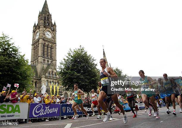 New Zealand runner Jonathan Wyatt passes the Mancester Town Hall at the start of the Mens Marathon at the XVII Commonwealth Games, Sunday.