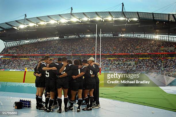 New Zealand sevens players have a team huddle after the Rugby sevens quater final between New Zealand and Wales held at the City of Manchester...
