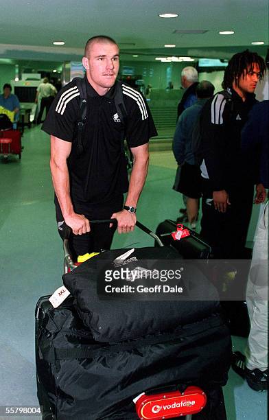 All Black, Keith Robinson rolls his baggage through arrivals at the Auckland International Airport, as the All Blacks arrive home from their end of...