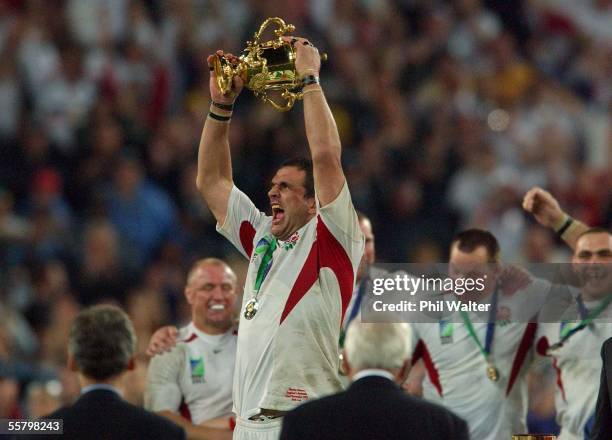 England's captain Martin Johnson holds up the William Webb Ellis Trophy following the 2003 Rugby World Cup Final played against Australia at the...