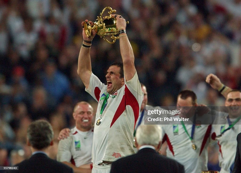 England's captain Martin Johnson holds up the Will