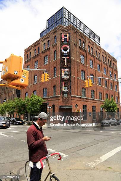 a street corner with wythe hotel in background - williamsburg stock pictures, royalty-free photos & images