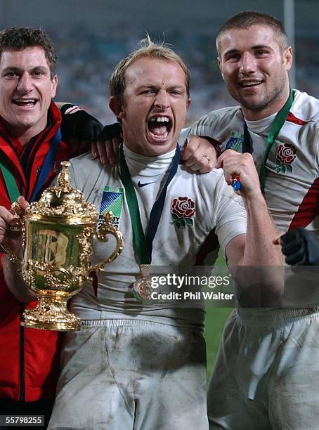 England's Matt Dawson celebrates with the William Webb Ellis Trophy with Ben Cohen following the 2003 Rugby World Cup Final played against Australia...