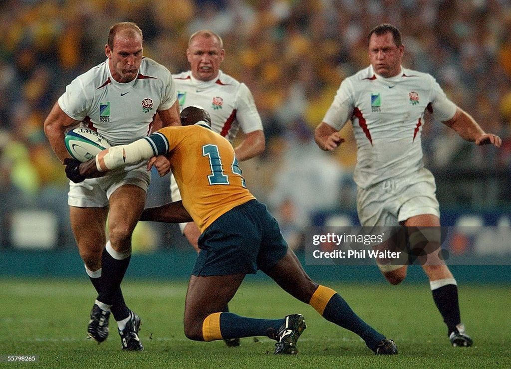 England's Lawrence Dallaglio is tackled by Austral