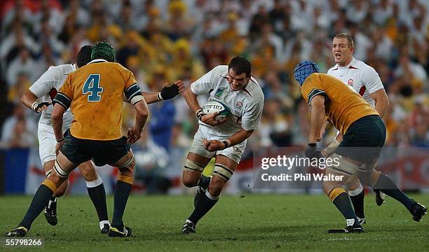 England's captain Martin Johnson breaks the Australian defence in the 2003 Rugby World Cup Final played at the Telstra Stadium,Saturday.England won...