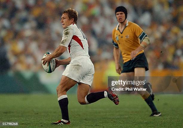 England's Jonny Wilkinson watched by Stephen Larkham in the 2003 Rugby World Cup Final played at the Telstra Stadium,Saturday.England won in extra...