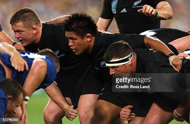 The All Black front row of Greg Somerville, Keven Mealamu and Dave Hewitt about to pack down in the scrum against France in their Rugby World Cup...