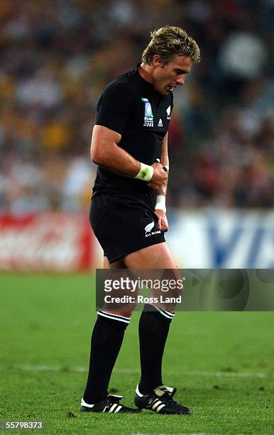 An injured Justin Marshall walks off the field during the All Blacks 1022 loss to the Wallabies in the Rugby World Cup 2003 semi final match at the...