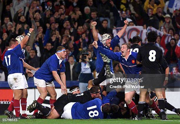 France celebrate their try scored by Fabien Galthie against the New Zealand All Blacks in their second test match played at the Stade Velodrome in...