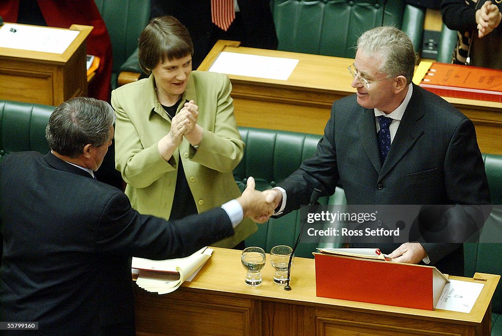 Prime Minister Helen Clark applauds as Jim Anderto