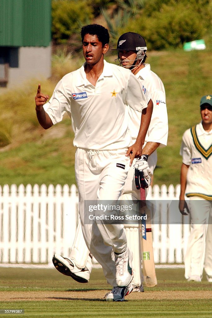 Pakistan's Ahmed Shabbir signals the wicket of New