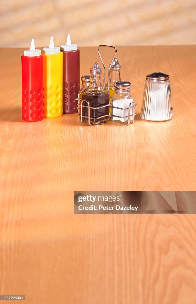Condiments in cafe with copy space