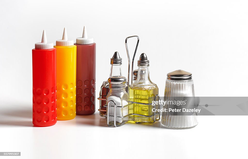 Condiments on white background