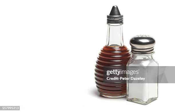 salt and vinegar with copy space - vinegar stockfoto's en -beelden