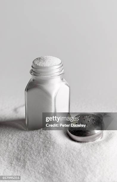 salt excess - health risk - saliera foto e immagini stock