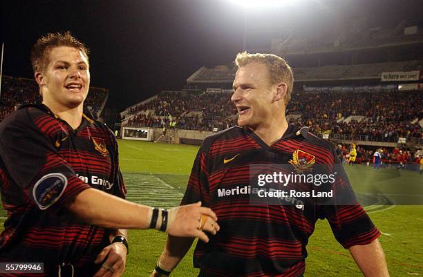 Richard McCaw and Scott Robertson celebrate the final whistle in the Air New Zealand NPC first division rugby trophy after their team beat Otago 3019...