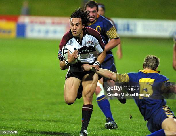 Rico Gear from North Harbour beats the last tackle of Hayden Reid from Otago, Gear went on to score the first try for North Harbour, during the semi...