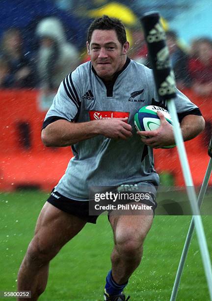 All Black Mark Hammett training during a heavy downpour at the ITM Stadium in Whangarei, during the first public training session in their buildup to...