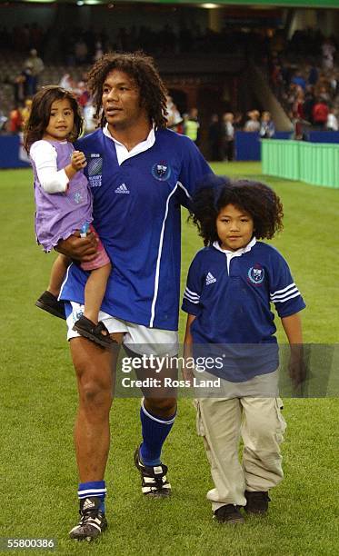 Samoan replacement Des Tuiavi'I walks his children Jasmin 2yrs and KirkStephen 6yrs around the groung following his sides 3522 loss to England in...