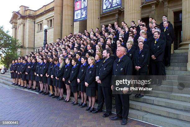 The New Zealand Olympic team pose for their official team photo outside the NSW Parliament before a reception held prior to the start of the 2000...