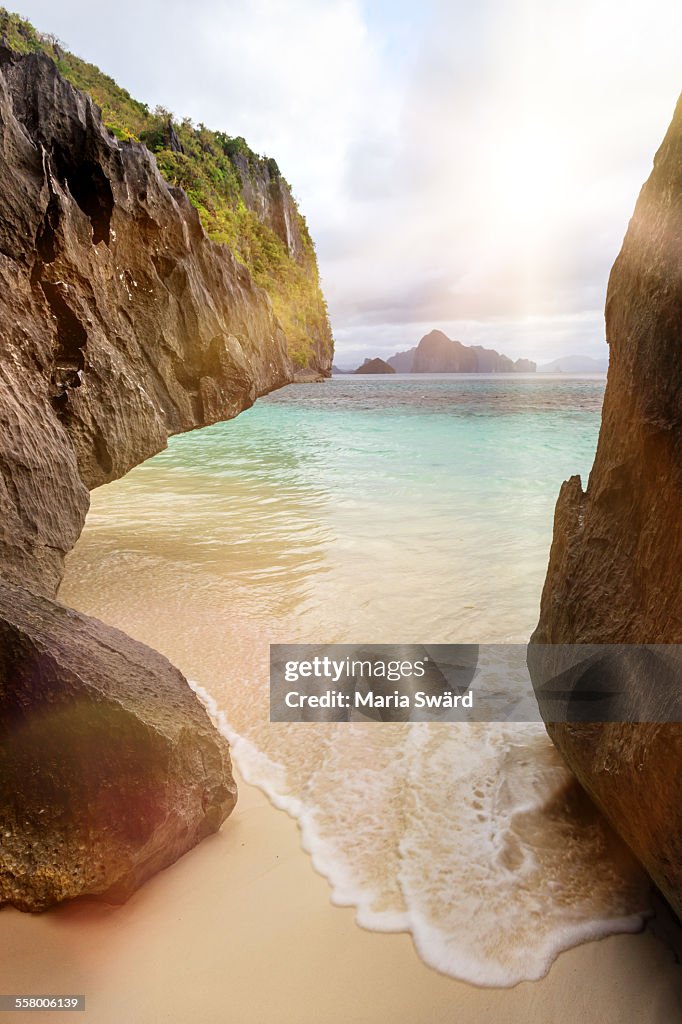 Beach framed by rocks, Palawan