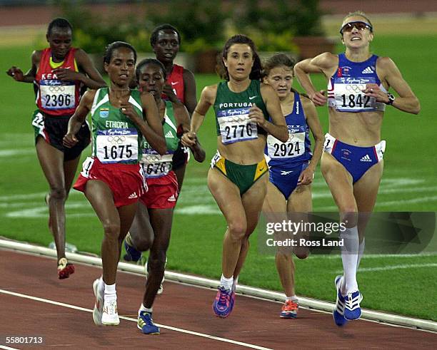 Strain shows on the face of Britain's Paula Radcliffe as she is overtaken with a lap to go in the Women's 10,000m at the Sydney Olympic Stadium by...