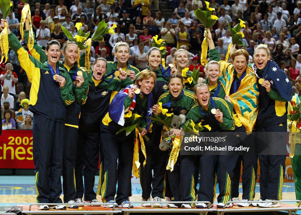 The Australian Netball team celebrate with their g